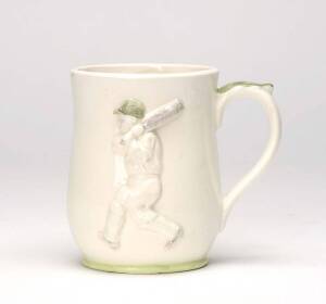 DON BRADMAN COFFEE MUG, decorated with figure of the Don batting, marked on reverse "One To the Don", and signed to base "E.J.Lord"?.