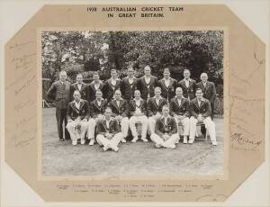 1938 AUSTRALIAN TEAM: Official team photograph, titled "Australian Cricket Team/ 1938", with 17 signatures on mount including Don Bradman, Sidney Barnes (scarce), Ern McCormick & Lindsay Hassett (some faults at right affecting signatures), window mounted,