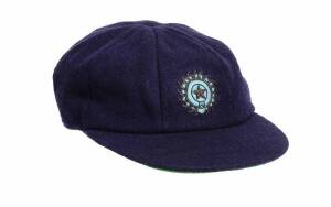 INDIAN TEST CAP, navy blue with wire embroidered Indian logo on front, player unknown. G/VG condition.