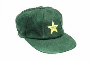 WASIM AKRAM'S PAKISTAN TEST CRICKET CAP, green wool, embroidered Pakistan logo on front, signed inside by Wasim Akram. G/VG condition. [Wasim Akram played 104 Tests & 356 ODIs 1984-2003].