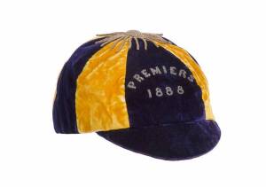 SOUTH MELBOURNE - 1888 VFA PREMIERS CAP, blue & yellow with wire embroidered "PREMIERS, 1888", some wear to inside lining, otherwise VG condition. [1888 was South Melbourne's 3rd VFA Premiership].