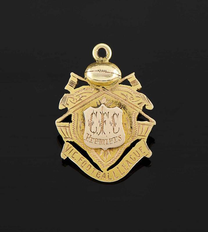 1908 CARLTON PREMIERSHIP MEDAL, 15ct gold medal decorated with football & pennants, with text at centre "C.F.C./ Premiers", with below "VIC. FOOTBALL LEAGUE", engraved on reverse, "Presd by A.McCracken Esq, President, 1908, E.Kelly", very attractive and r