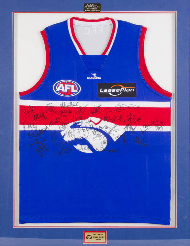 FOOTSCRAY: Western Bulldogs jumper signed by 2006 team, with c34 signatures, window mounted, framed & glazed, overall 78x101cm.