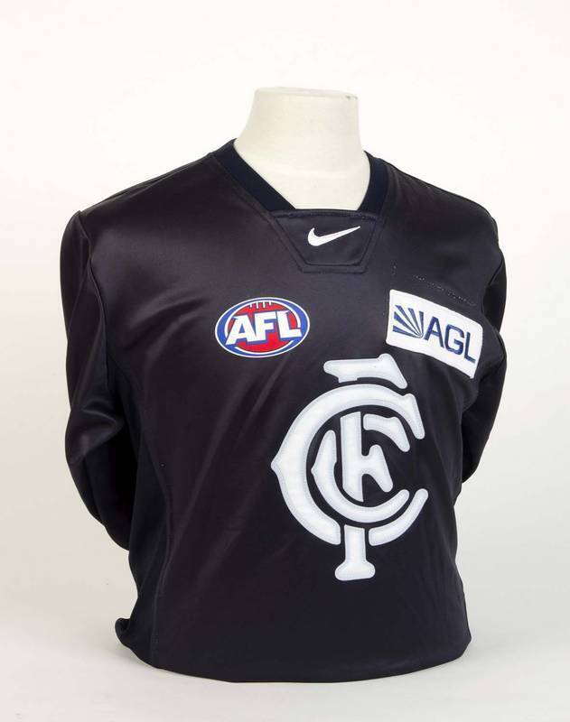 CARLTON: 2004 Carlton home jumper, number 32 Bret Thornton. During the season Carlton had various jumper sponsors, AGL was only used in round 21 against Melbourne.