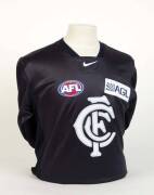 CARLTON: 2004 Carlton home jumper, number 32 Bret Thornton. During the season Carlton had various jumper sponsors, AGL was only used in round 21 against Melbourne.