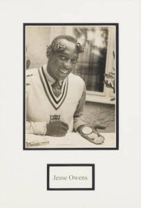 JESSE OWENS, signed photograph, window mounted, framed & glazed, overall 31x43cm.