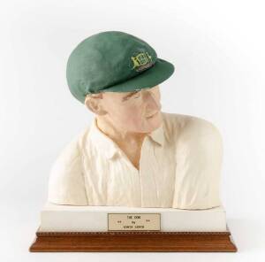 DON BRADMAN BUST: "The Don" bust by sculptor Edwin Leech, signed to base and numbered Ed.No.14, hand-painted white plaster on rectangular wooden base, with caption "The Don, By Edwin Leech", 30cm tall. G/VG condition.