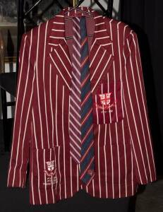 CRAIG McDERMOTT'S QUEENSLAND BLAZER, navy blue, double-breasted, with "Bulls" badge on pocket; plus Queensland Bulls tie; Ipswich Grammar School blazer with school badge & "1st XI - 1981" embroidered on pocket; school tie; maroon blazer with "Queensland/C