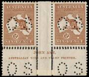 6d Chestnut, perforated OS, Ash Imprint [N over N] pair from the upper plate, with double perforations horizontally and vertically at the base. Mint, with some tone spots. Unique and unrecorded in the Commonwealth Specialists' Catalogue which notes only t