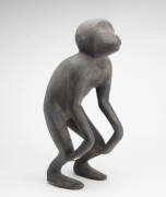 A Carved Ritual Monkey, Two Backstrap Looms and Ceremonial Mat.&nbsp;Mentawai Island; Bali; Lombok; Sumatra, Indonesia. Carved wood, rattan, cotton, twine and pokerwork. 51cm; 91cm; 101cm and 50cm long (4)