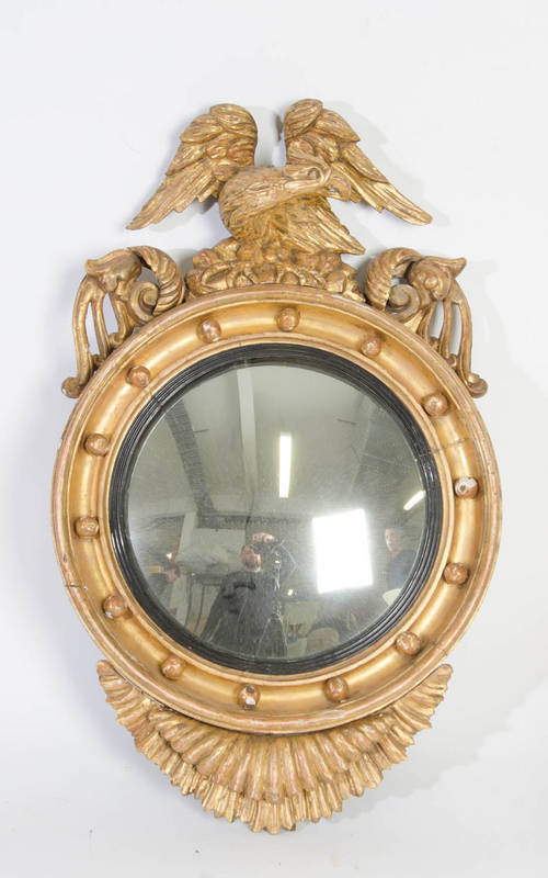 Regency ornate gilt framed convex mirror