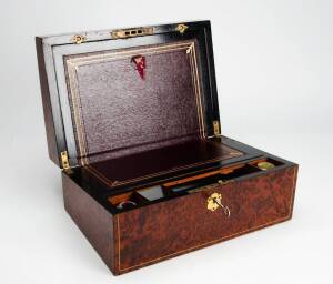 WRITING BOXES: Two 19th century amboyna writing slopes. Height 16cm, width 35cm, depth 25cm approx.