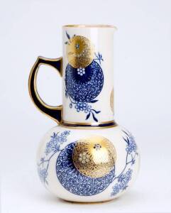 Doulton Burslem blue & white porcelain jug with gilt decoration. 24cm