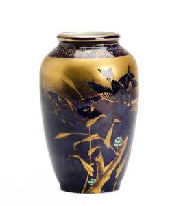 Royal Vienna blue porcelain vase with gilded highlights. 14cm