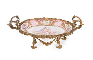 French pink porcelain comport with gilt metal mounts, early 20th century. Height 14cm, width 40cm, depth 20cm
