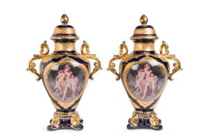 Pair of blue & gilt ornate porcelain mantle vases, 20th century. 65cm