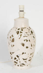 KLYTE PATE: Pierced pottery lamp base with dragon motif. 35cm