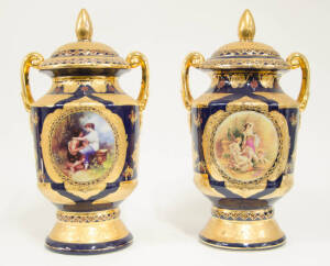 Pair of mantle vases. Blue porcelain with gilt decoration, 20th century. 45cm