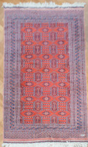 RUG: Red & blue tribal rug, North Indian origin. 252 x 152cm