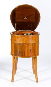 BAND MASTER: Horse shoe shaped gramophone. Cylindrical inlaid timber cabinet on saber legs, circa late 1920's. Extremely RARE.