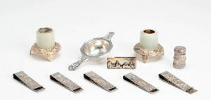 VARIOUS: silver money clips (6); silver tea strainer; pair of silver condiments; silver finished pill box. (10 items)