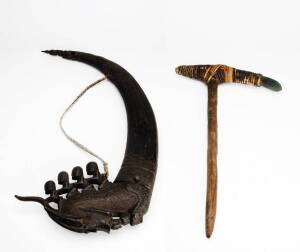 Batak Shaman horns (63cm) & a Papua New Guinea adze (50cm), mid 20th century.