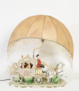 French porcelain table lamp in the form of a carriage & horses, 20th century. 52 x 60cm