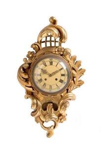 WALL CLOCK: Ornately carved & gilded timber case in the rococo style, early 20th century