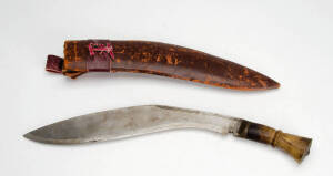 KHUKURI: Ghurka knife in leather scabbard, c1940s. 43.5cm