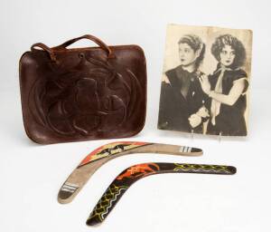 HOUSTON SISTERS: Collection of photographs, postcards, news clippings & letter; plus 2 boomerangs & an Australiana leather satchel. (19 items)