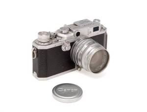 CANON CAMERA CO. (Japan): Canon screw mount camera Model IVSB2 SN 177500 with 50mm f1.8 SN 139700. With Canon lens cap, generic filter and maker's leather ERC. Widely regarded as the best bottom loading rangefinder made. A fine example.
