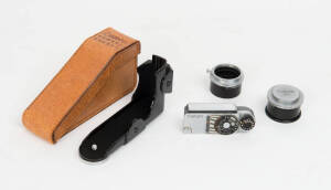 CANON CAMERA CO. (Japan): Canon rangefinder accessories. Comprising: A Canon camera holder Vt in fitted case, lens hoods (2) for 100mm f3.5 - standard 34mm and 36mm clamp-on for Type 4 lens. Canon rangefinder shoe light meter (light responsive). Body cap.