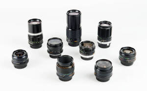 MINOLTA (Japan): Minolta manual focus lenses (MC/MD). A group of (9) lenses comprising: MD 28mm f2.8, MD and MC 28mm f3.5, MC 35mm f2.8, MD 50mm f1.4, MC 50mm f3.5 Macro, MC 135mm f2.8 and 3.5 and MD 200mm f4. Nearly all lenses with caps and a case.