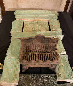 Pair of French celadon green porcelain fire surrounds in the Art Nouveau manner, c1890s. Height 130cm, width 95cm each