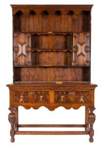 An oak Jacobean style dresser, English 19th century. 216cm high, 135cm wide and 47cm deep. (With a separate marble top for the dresser base)