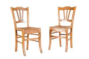 A set of four rush seated farmhouse kitchen chairs