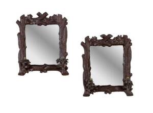 A pair of faux wood twin branch mirror lights