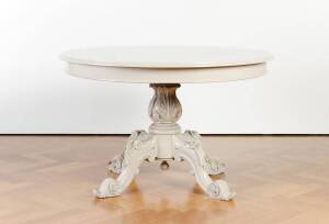 A beige painted Victorian circular dining table, English 19th century