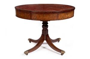 DRUM TABLE: A Regency mahogany circular 8 drawer drum/rent table with insert embossed leather top, finely turned column resting on out-swept legs with brass claw feet and castors, c1820. Height 87cm, diameter 113cm