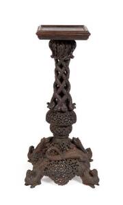 Anglo-Indian pedestal. Ornately carved padouk with serpents and dragons, mid 19th century. Height 83cm
