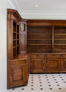 French farmhouse fruit wood corner sideboard with built in clock, early 19th century.