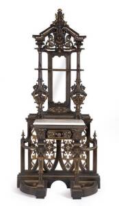 COALBROOKDALE HALLSTAND: English cast iron decorated with griffins & fauns, late 19th century. Height 223cm, width 104cm, depth 40cm