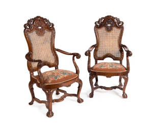 Pair of Chippendale style ornately carved walnut thrown chairs, early 20th century