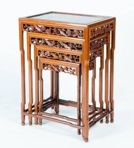 Chinese nest of 4 carved rosewood coffee tables. Height 71cm, width 49cm, depth 35cm