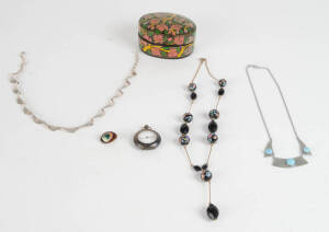 A collection of costume jewellery inluding Venetian glass necklaces, silver necklace and pocketwatch.
