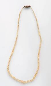 A natural graduated pearl necklace.