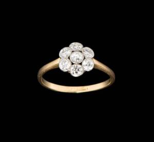 A diamond floral cluster ring. Yellow gold.