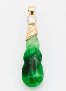 A jade and diamond pendant. 18ct yellow gold.&nbsp;