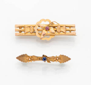 Two stone set bar brooches. 9ct yellow gold.