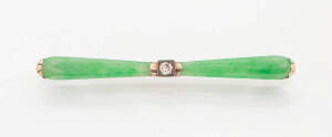 A jade and diamond brooch. 9ct yellow gold.